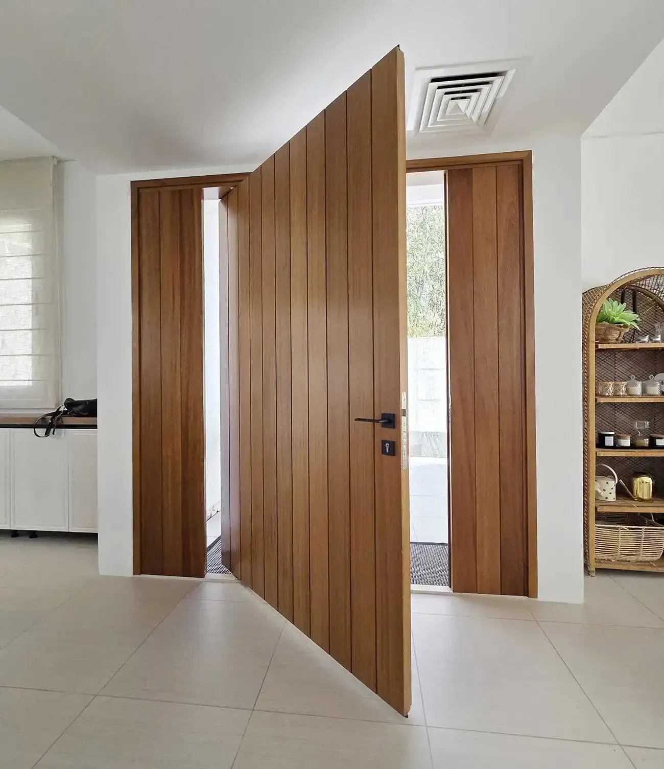 Interior view of the pivot door swung open on its central axis